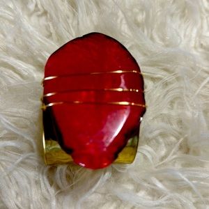 Hand made hammered gold cuff with natural pink stone.